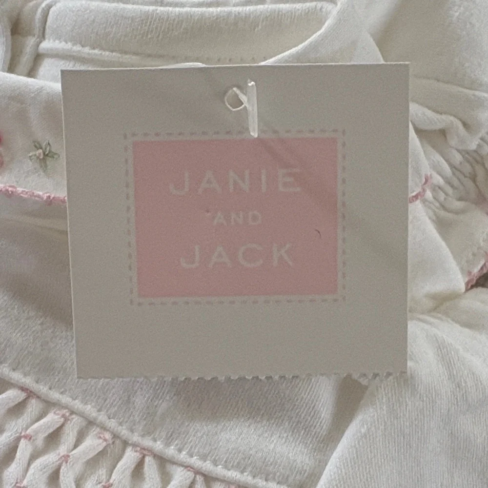 Janie and Jack White Smocked Cotton One-Piece with Pink Trim